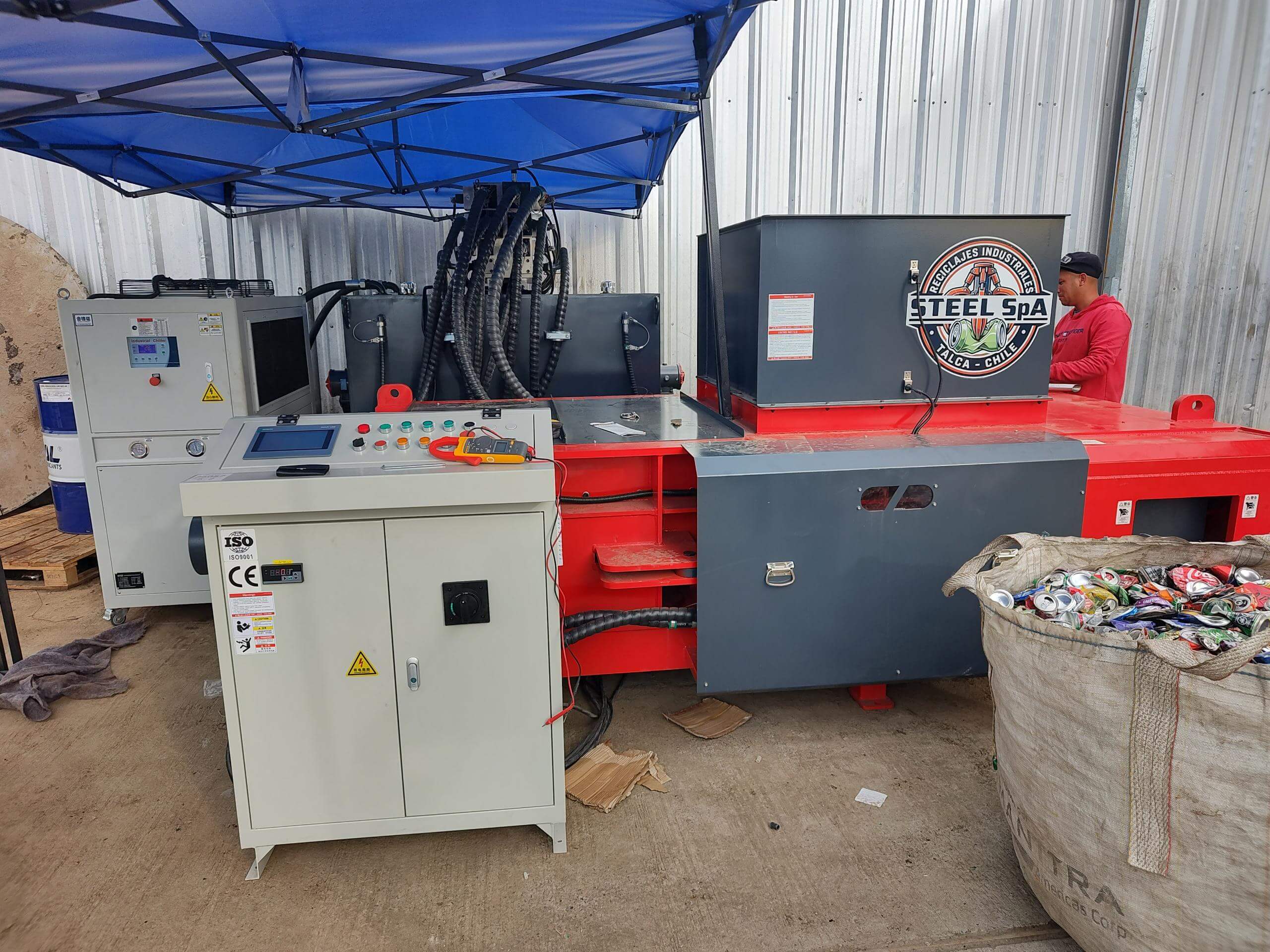 Santiago, Chile: ENERPAT Enfardadeira de sucata tipo funil AMB-H1510-160 instalada